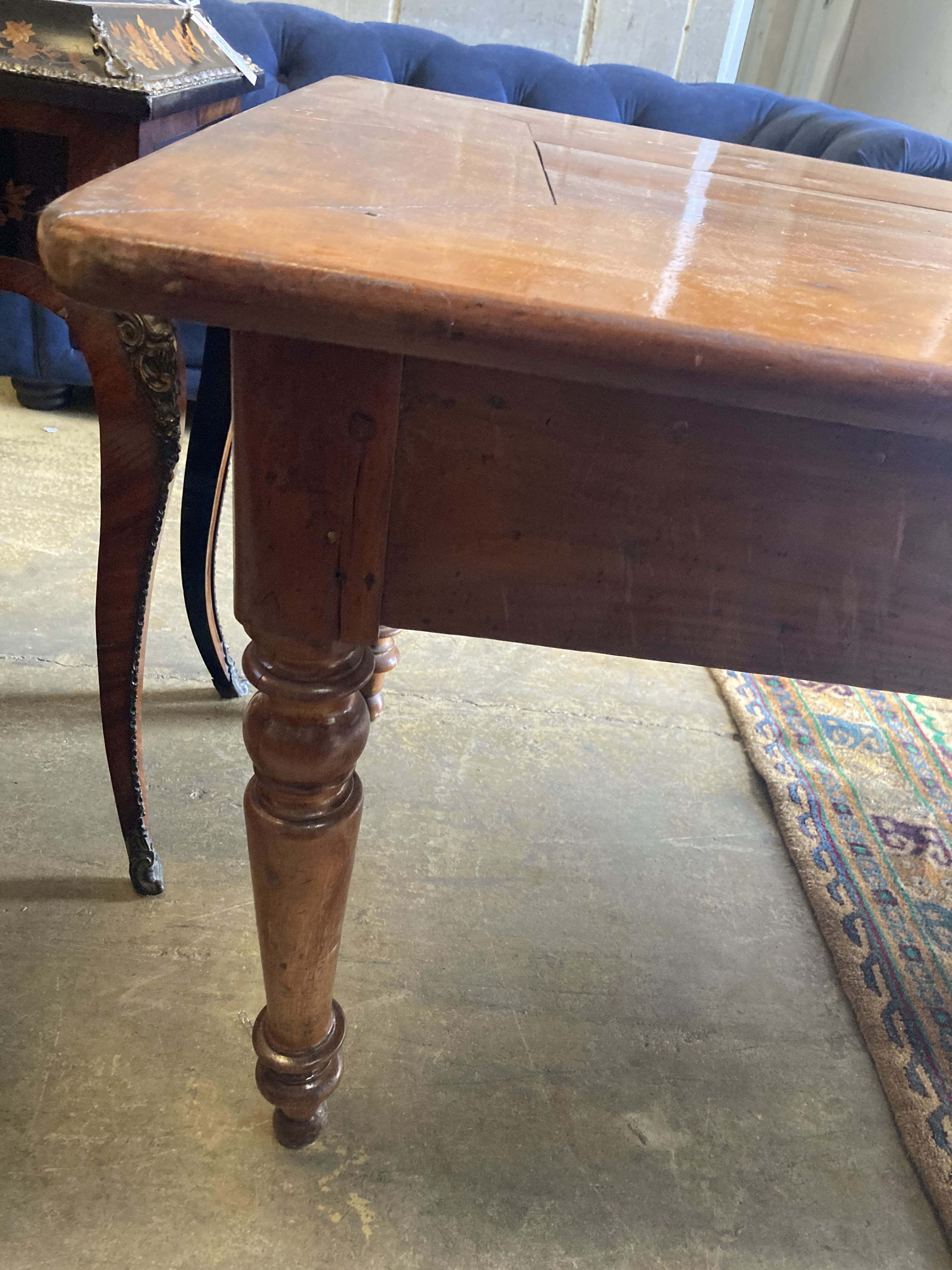 A 19th century French cherry farmhouse table, length 183cm, depth 82cm, height 73cm